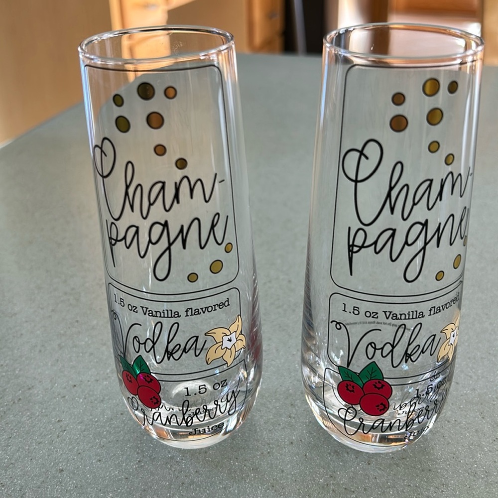 Champagne Flutes with drink recipe imprint.